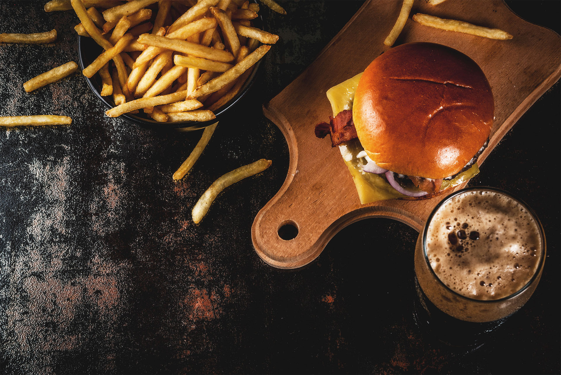 A juicy burger on a platter.